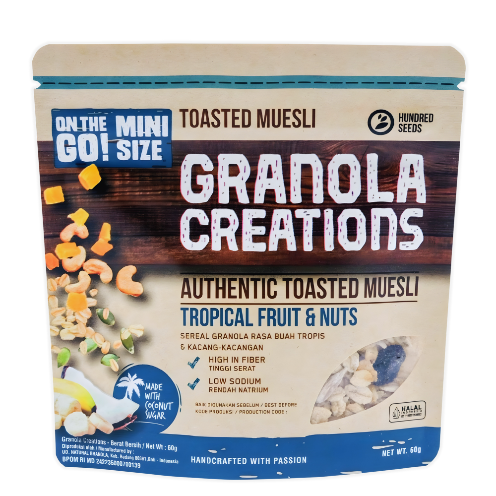 Package of Granola Creations toasted muesli with tropical fruit and nuts flavor on a white background